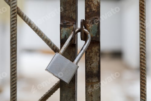 Preview: Padlock On A Metal Fence. Symbol For Safety Or Restrictions And Lockdown. Selective Focus