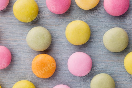 Preview: Small Round Candy-Colored Pastels On Pastel Background.