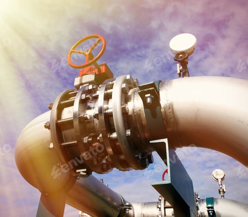 Preview: Industrial Zone, Steel Pipelines And Valves Against Blue Sky