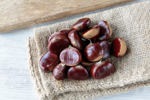 Preview: Bunch Of Fresh Raw Chestnuts In Autumn Season