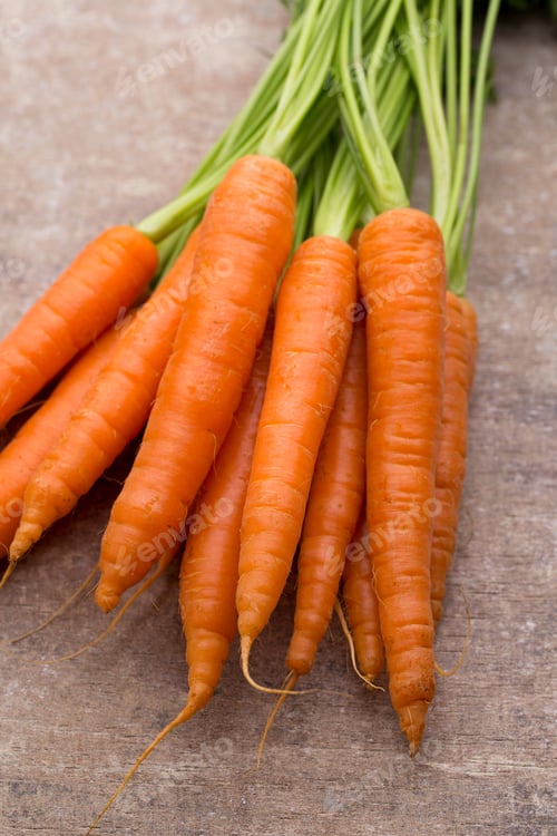 Preview: Fresh And Sweet Carrot On A Grey Wooden Table.