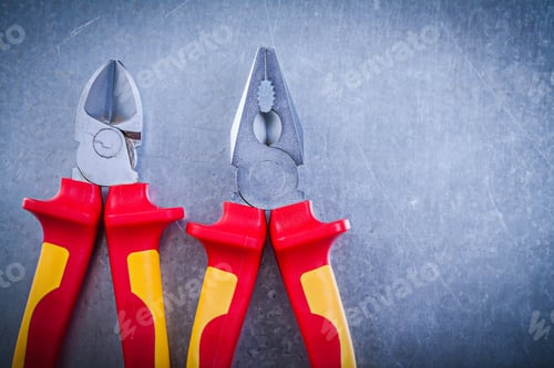 Preview: Pliers Nippers On Metallic Background Horizontal Image Electricity Concept.