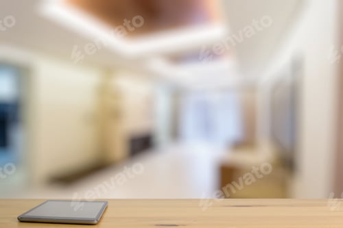 Preview: Tablet On Wooden Table In The Living Room