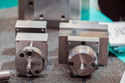 Preview: Closeup New Design Of Parts For Machine On Exhibition Show; Note Shallow Depth Of Field
