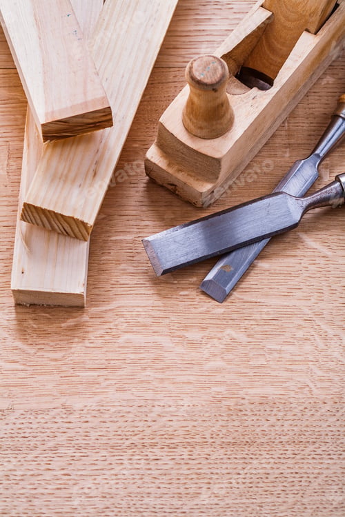 Preview: Carpentry Chisels Woodworkers Plane And Planks On Wooden Board