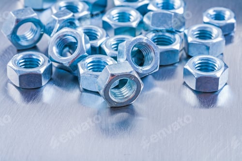 Preview: Collection Of Stainless Screw Nuts On Metallic Background Construction Concept