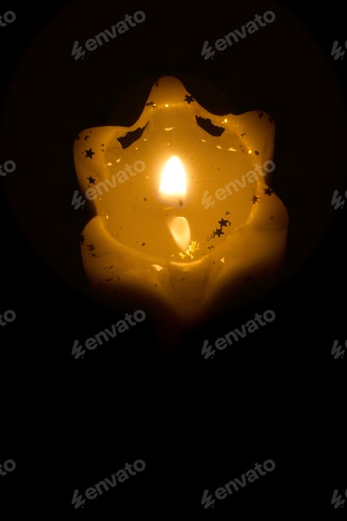 Preview: Flame Of Christmas Candles On A Dark Background.