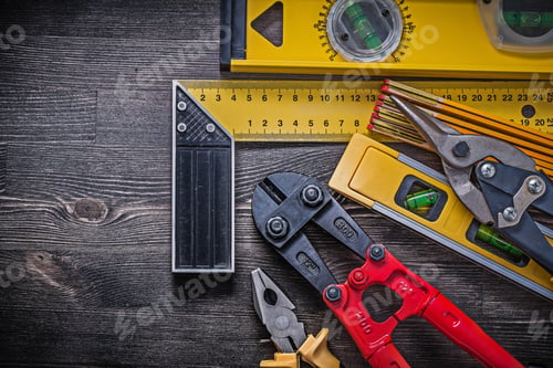 Preview: Group Of Construction Items On Wooden Background Maintenance Concept.