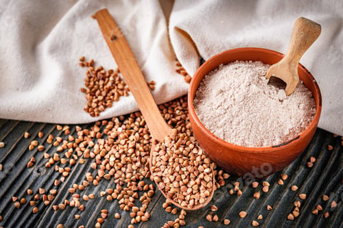 Preview: Fresh Natural Buckwheat Flour On A Dark Wooden Rustic Background Culinary Concept