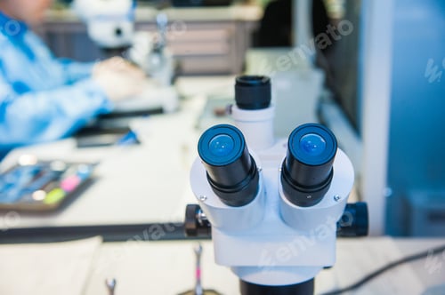 Preview: Close-Up Shot Of Microscope With Metal Lens At Laboratory