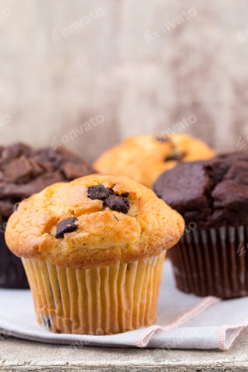 Preview: Chocolate Muffins With Chocolate Vintage Background, Selective Focus.