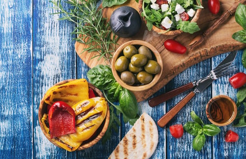 Preview: Set Of Greek Mezze: Pita Bread, Grilled Bell Peppers, Green Olives And Feta With Greens Decorated