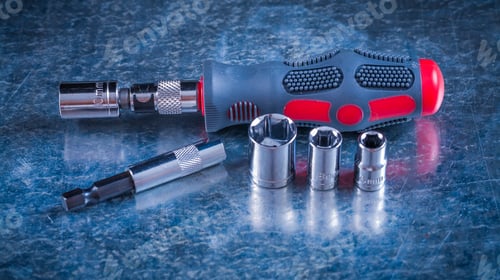Preview: Screwdriver Bit Holders Replaceable Heads On Scratched Metallic Surface Close Up View Construction