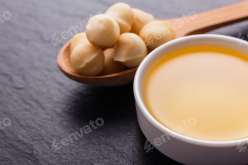 Preview: Delicious Macadamia Nuts On A Dark Stone Background