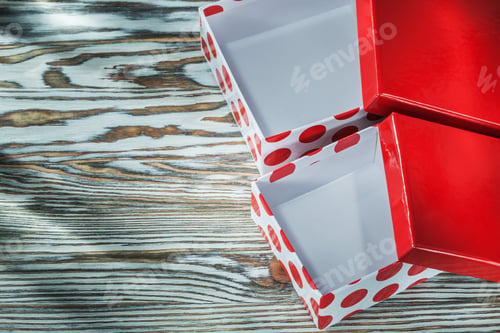 Preview: Red Opened Present Boxes On Wooden Background.
