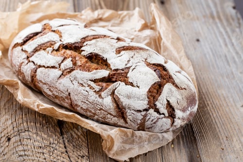 Preview: Bread Background, Top View Of, Black And Rye Loaves On Black.