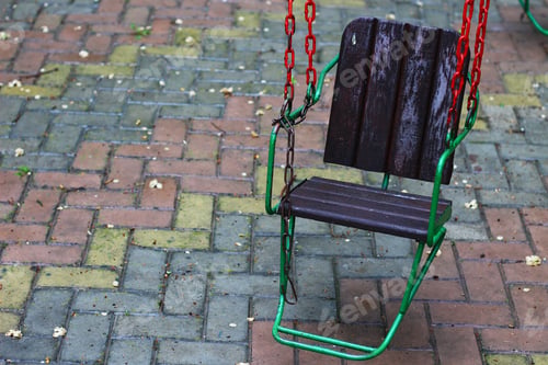 Preview: Swing On A Chain In The Playground. No One In The Period Of Lockdown