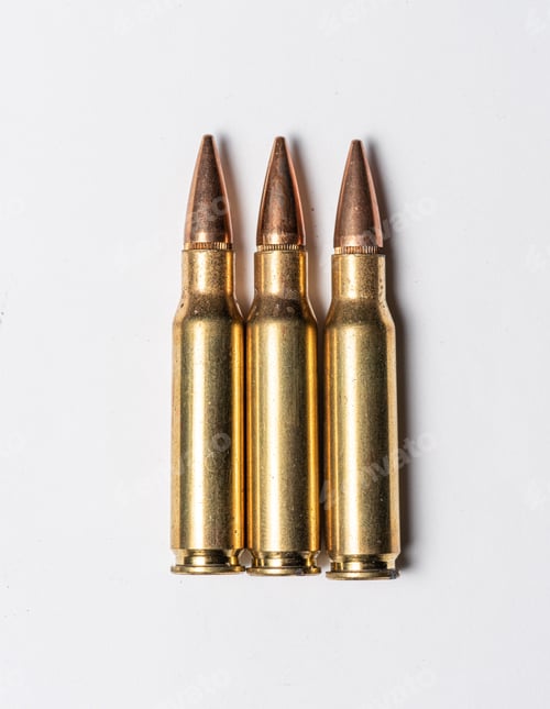 Preview: Three Rifle Bullets On White Background.