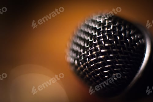 Preview: Microphone Head Extreme Close Up Out Of Focus Stage Lights In Background