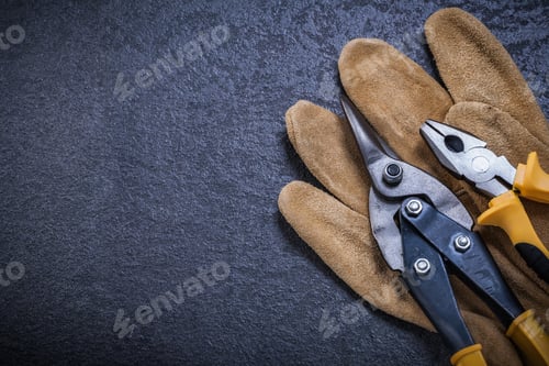 Preview: Sharp Tin Snips Pliers Leather Safety Glove Construction Concept.