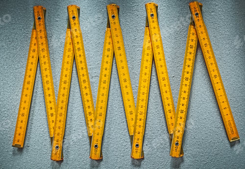 Preview: Wooden Meter On Concrete Background Construction Concept.