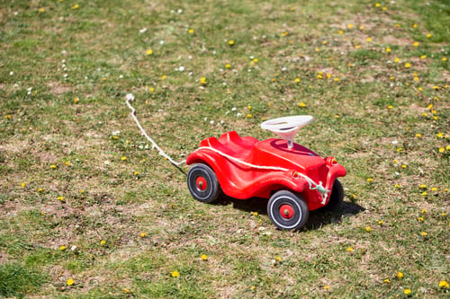 Preview: Little Toy Car For Children On The Grass Field, Outdoor Summer Activities.