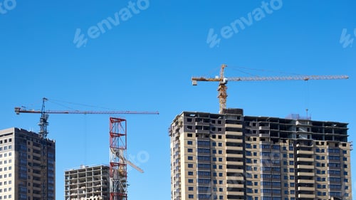 Preview: Construction Of New Residential High-Rise Buildings With High-Rise Cranes On The Background Of A