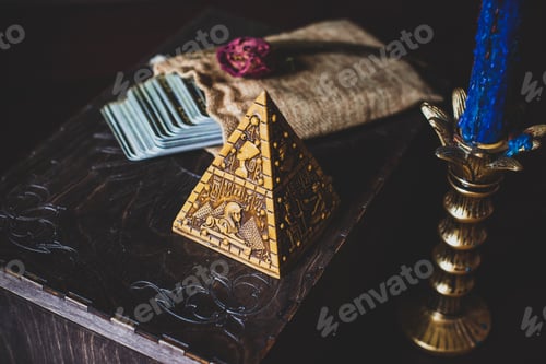 Preview: A Fortune Teller, Witch Stuff On A Table, Candles And Fortune-Telling Objects. The Concept Of