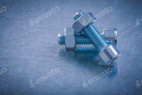 Preview: Bolt Details And Nuts On Scratched Metallic Background Construction Concept.