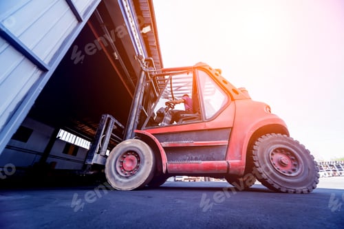 Preview: The Big Industrial Forklift Drives Into The Warehouse.