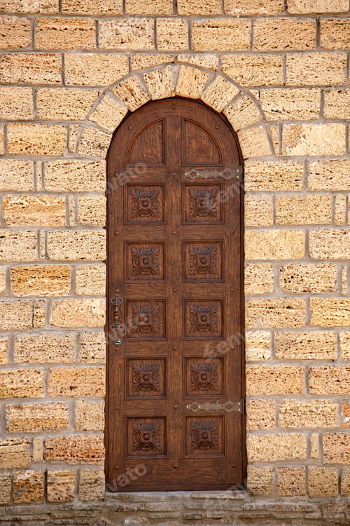 Preview: Antique Wooden Entrance Door With A Beautiful Ornament In The Medieval Style.