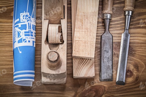 Preview: Blue Construction Plan Shaving Plane Chisels Wooden Studs On Wood Board.