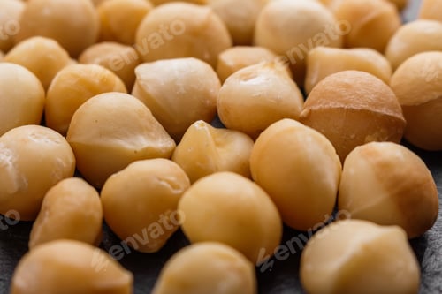 Preview: Delicious Macadamia Nuts On A Dark Stone Background