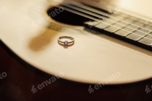 Preview: Proposal Ring On The Guitar