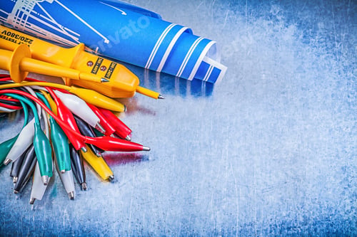 Preview: Yellow Electrical Tester Crocodile Cables Set Blue Construction Plans On Metallic Background