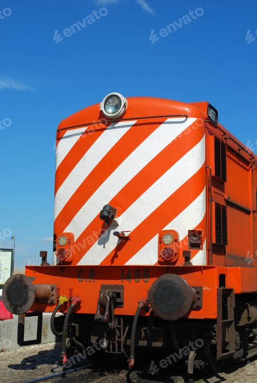 Preview: Photo Of A Colorful Transportation Train With Blue Sky Background