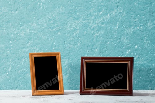 Preview: Wooden Photo Frames On Table, Blue Wall