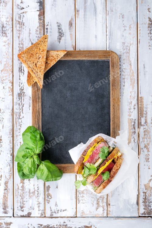 Preview: Club Sandwich With Steak And Halloumi Cheese Served With Mustard Ruccola And Parsley Over A Wooden