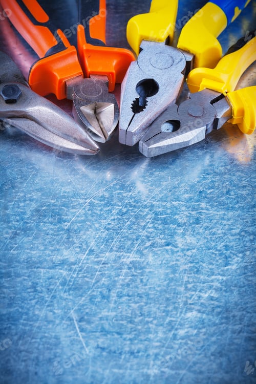 Preview: Copy Space Image Of Tin Snips Gripping Tongs Nippers On Scratched Vintage Metallic Background