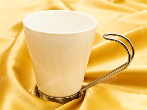 Preview: Photo Of Single White Mug At The Golden Fabric Drapery