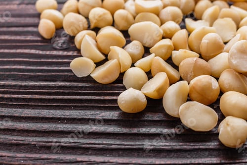Preview: Delicious Macadamia Nuts On A Wooden Rustic Background