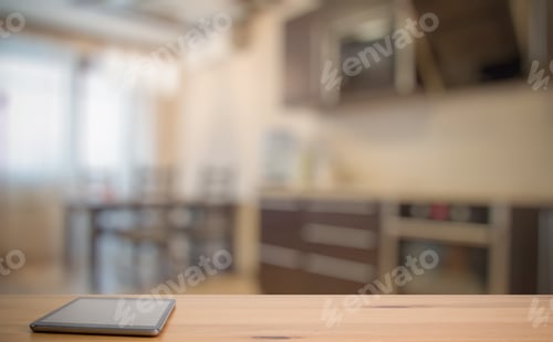 Preview: Tablet On Wooden Table In The Kitchen
