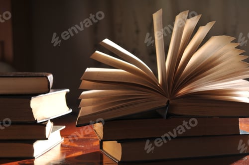 Preview: An Open Book On A Dark Background