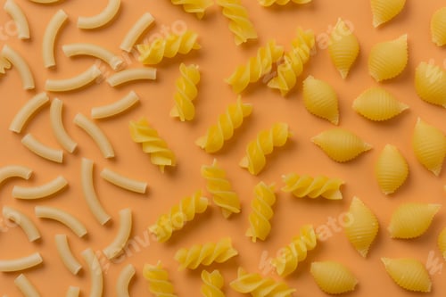 Preview: Different Types Of Pasta On An Orange Background