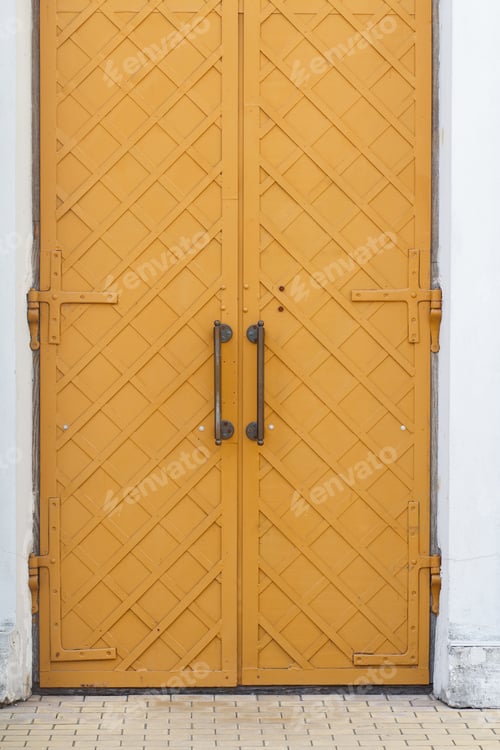 Preview: Antique Looking Yellow Metal Door With Iron Handles And Accessories