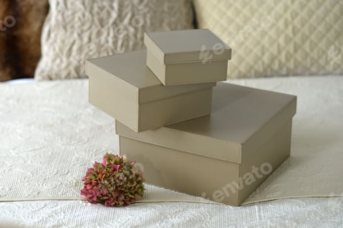 Preview: Brown Leather Storage Boxes In A Bedroom