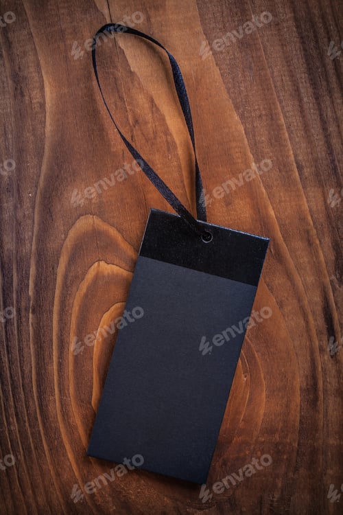 Preview: Black Price Label Tag On Old Wooden Board