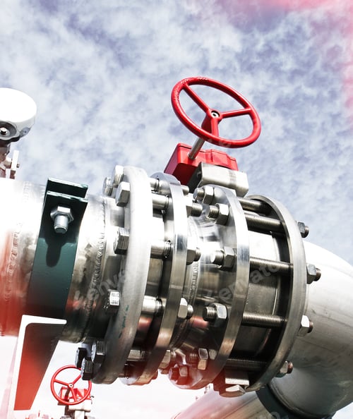 Preview: Industrial Zone, Steel Pipelines And Valves Against Blue Sky