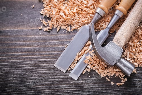 Preview: Close Up Of Joinerã?¢??S Hammer And Metal Firmer Chisels In Wooden Planning Chips On Vintage Wood