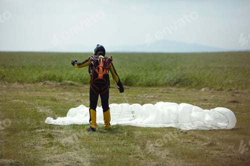Preview: Skydiver Figure After Landing With A Reserve Parachute, Rear View.